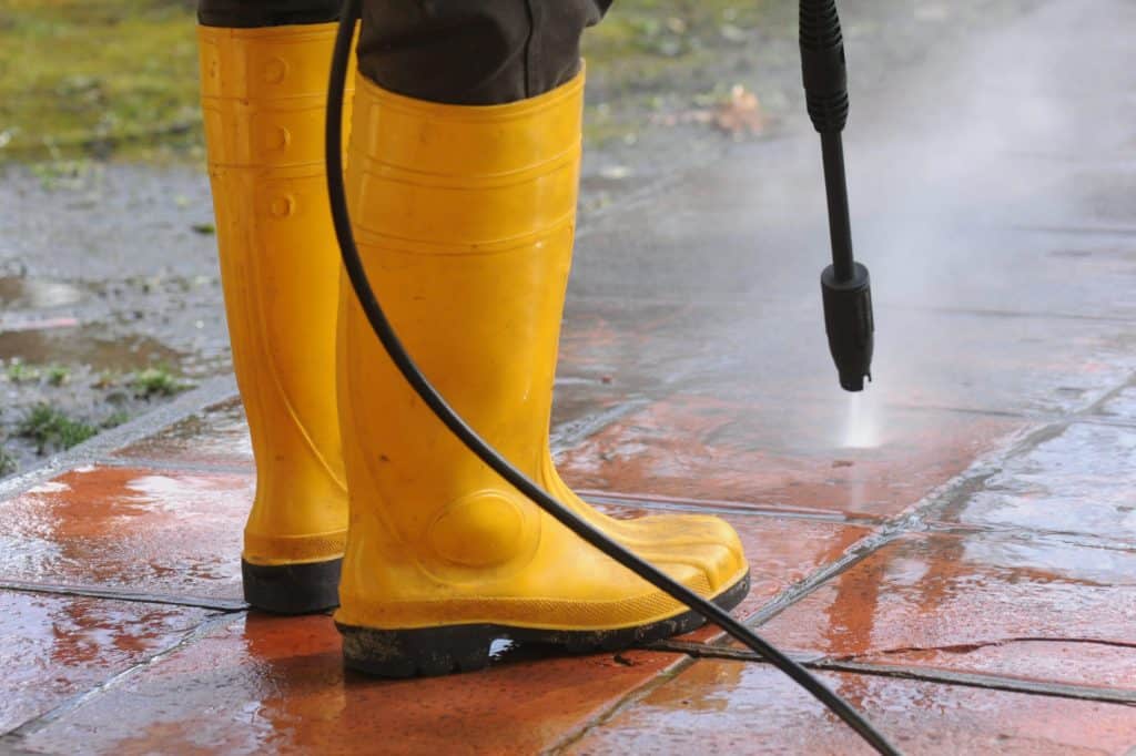 Clendo pressure washing a Canberra driveway